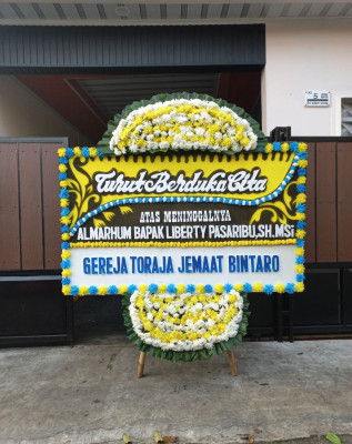 Papan Bunga Duka di Karangpanimbal